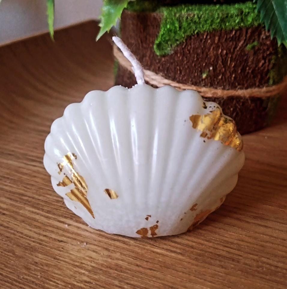 شمعة الصدفة الذهبيه